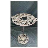 Cast iron plant stand with circular opening