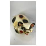 Vintage carnival chalkware piggy bank, smiling pig