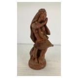 Hula dancer carved out of wood made in Hawaii