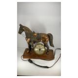 Cast metal horse figurine, clock base11'x10'x8'