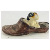 Ceramic dog in shoe toothpick/match stick holder