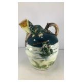 Porcelain jug w/ frog motif 7' x 5'