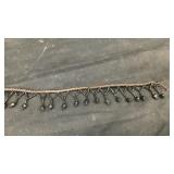 23 feet and 7 inches of black beaded fringe