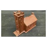 Metal coin bank of Little Brown Church in the Vale