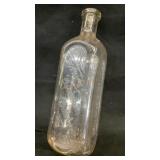 Clear glass Dr Peter Farney & Sons medicine bottle