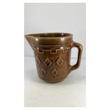 5' brown ceramic pitcher