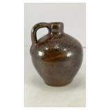 G.A. Art Pottery brown ceramic jug 3.25' x 3'