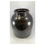 Dark brown pottery jar (no markings)