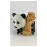 Panda in tree ceramic vessel 4' tall