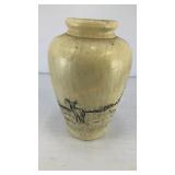 Rustic clay pot w/ buck, doe, fawn in a field