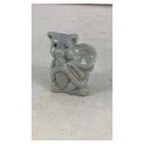 Miniature ceramic pig playing trombone 1.75' T