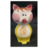 Ceramic brown-haired standing pig coin bank