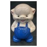Ceramic pig in overalls piggy bank