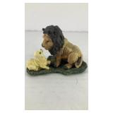 Small ceramic lion and lamb figurine