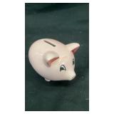 Porcelain pink Colorado piggy coin bank