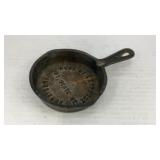 Cast iron pan advertising Ross Furniture