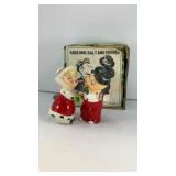 Kissing couple ceramic salt and pepper shakers