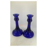(2) blue glass round candle holders 7' x 4'