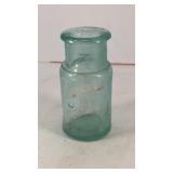 Vintage glass bottle w/ blue hue & flared lip