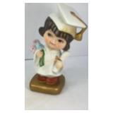 Porcelain graduate girl figurine, 4.5' tall