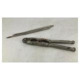 Vintage nut cracker and (2) nut picks