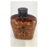 Glass flask wrapped in leather, Menomonie, WI
