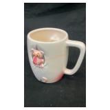 Pink Panther looking thru ceramic coffee mug