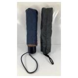 (2) umbrellas; (1) black & (1) multi-color