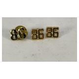 Gold tone stud earrings & pin for 1986 or 1998
