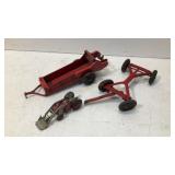 Antique metal tractor and trailer toys