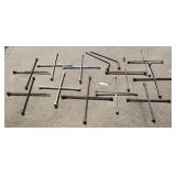 GROUP OF MISC. 4-WAY LUG WRENCHES & TIRE IRONS