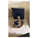 INT. SILVER CO FRAME, CANDLE STICK HOLDER, PLATE