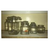 8 LIDDED GLASS STORAGE JARS
