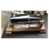 "THE INTIMIDATOR ROLLS A 7" BOWIE KNIFE & DISPLAY