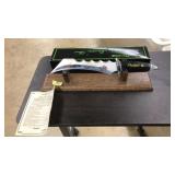 1998 CHAMPION "THE INTIMIDATOR" KNIFE AND DISPLAY