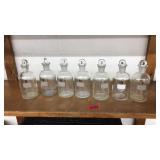 7 VNTG. GLASS APOTHERCARY BOTTLES