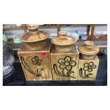 SET OF 3 LIDDED POTTERY JARS SIGNED ON BOTTOM