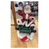SANTA ON SNOW SLED FIGURINE