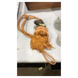 LEATHER HORSE HEAD ON TASSLE