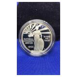 NATIONAL COMM SERVICE COMMEMORATIVE COIN