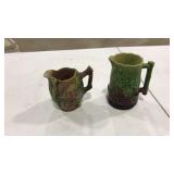 PAIR OF MAGALLIC GLAZED MILK PITCHERS