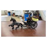 CAST IRON RIDER ON CARRIAGE