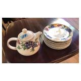 8 PLATES AND TEA POT BY NANCY CALHOUN