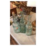 3 DECORATIVE GLASS BOTTLES