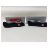 (2) VICTORINOX SWISS ARMY KNVES: TREKKER & RESCUER