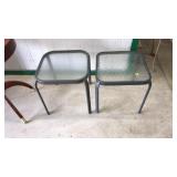 2 GLASS AND METAL PATIO SIDE TABLES