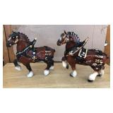PAIR OF CERAMIC FIGURINES OF DRAFT HORSES