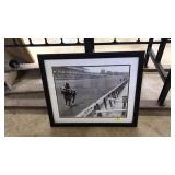 FRAMED PHOTOGRAPH OF SECRETARIAT, SIGNED BY JOCKEY