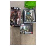 3 DOOM SLAYER COLLECTIBLE FIGURINES, IN BOXES