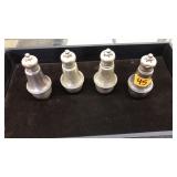 4 STERLING WEIGHTED CANDLESTICK HOLDERS